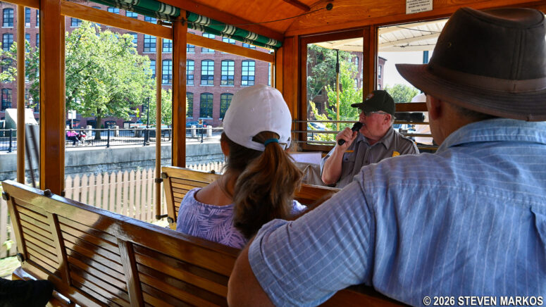 Passengers take the Lowell Trolley to a canal boat tour at Lowell National Historical Park