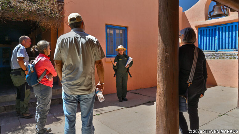 Ranger conducts a tour of the Forked Lightning Ranch main house at Pecos National Historical Park