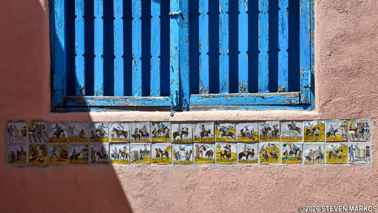 Painted ceramic tiles featuring Don Quixote inside the courtyard at the Forked Lightning Ranch, Pecos National Historical Park