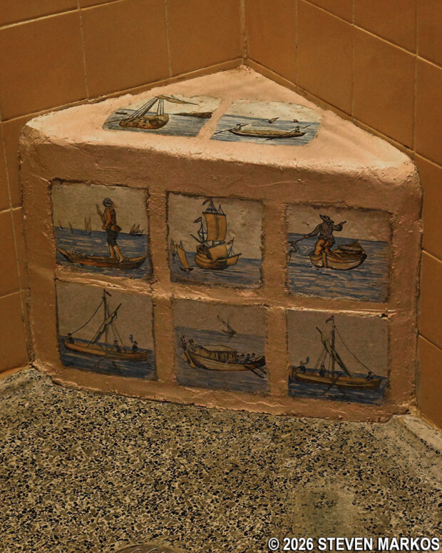 Built-in shower seat with hand-painted tiles inside a bathroom at the Forked Lightning Ranch, Pecos National Historical Park
