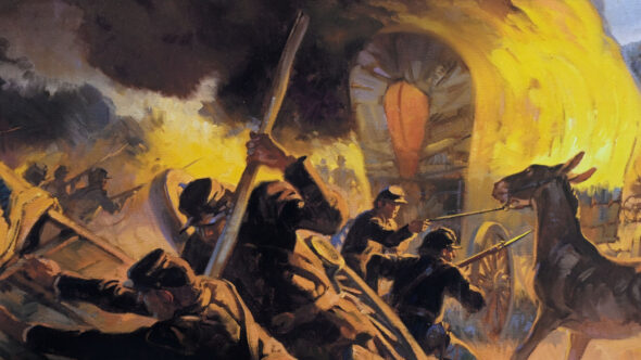 Union troops burn the Confederate supply wagons during the Battle of Glorieta Pass