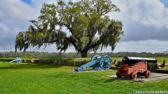 Artillery guns and the reconstructed rampart at Chalmette Battlefield, Jean Lafitte National Historical Park and Preserve
