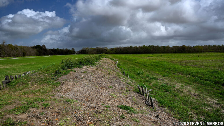 Reconstructed American rampart (hill) and remnants of the Rodriguez Canal (base of the rampart on the right) at Chalmette Battlefield, Jean Lafitte National Historical Park and Preserve