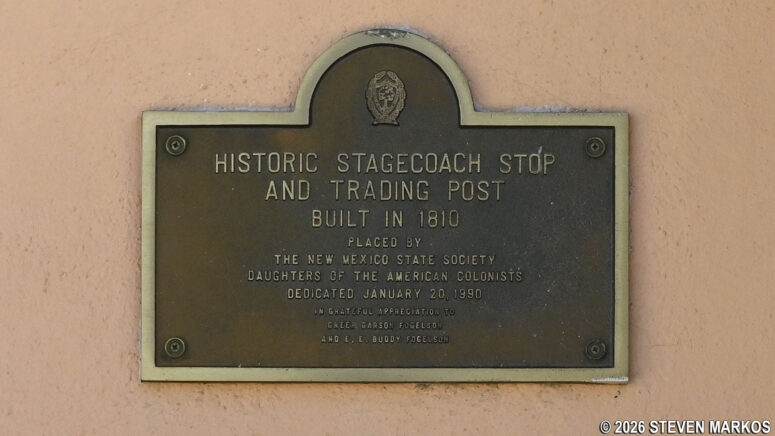 Historical marker on the wall of the Trading Post at Pecos National Historical Park