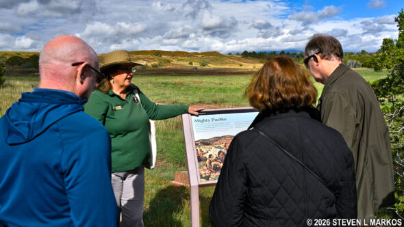 Park volunteer leads a tours along the Ancestral Sites Trail at Pecos National Historical Park