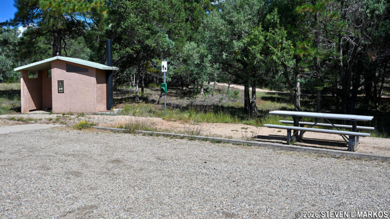 Picnic table and restroom at the Glorieta Pass Battlefield unit of Pecos National Historical Park