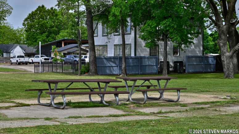 Picnic tables next to the parking lot at President William Jefferson Clinton Birthplace Home National Historic Site