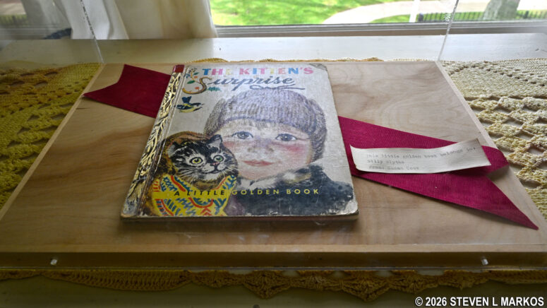Book that belonged to Bill Clinton as a child on display in his birth house bedroom, President William Jefferson Clinton Birthplace Home National Historic Site