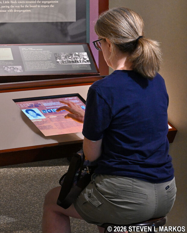 Visitor to the Little Rock Central High School Visitor Center at one of the many interactive exhibits, Little Rock Central High School National Historic Site