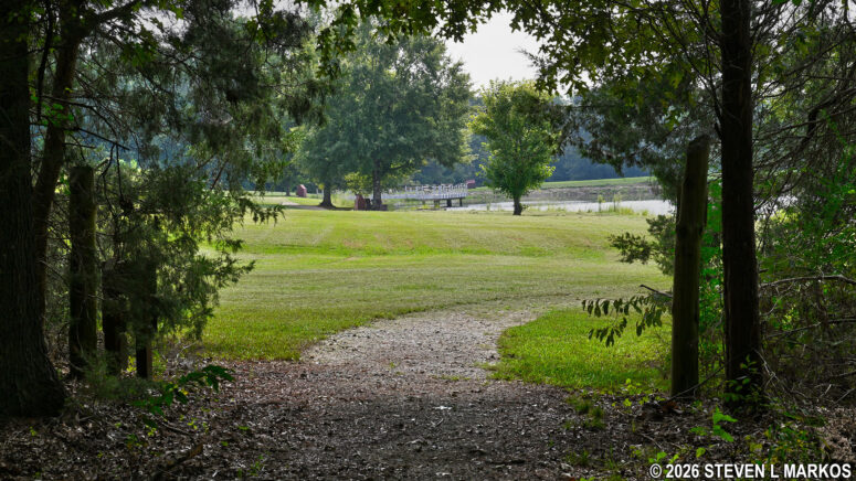 Fisherman's Trail emerges from the forest at the southeastern end of the Star Fort Pond, Ninety Six National Historic Site